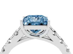 Fancy Blue Princess Cut Diamond Solitaire Ring Set in Platinum with Cut-Down Micro Pavé Band and Prong Setting
