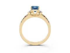 Fancy Blue Emerald Cut Diamond Three-Stone Pavé Ring Set in Yellow gold with Prong Setting