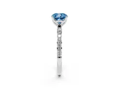 Fancy Blue Cushion Cut Diamond Solitaire Engagement Ring Set in Platinum with Round Pavé Band and Prong Setting