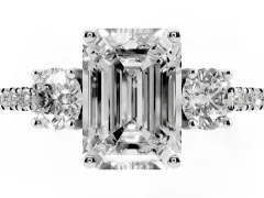 Emerald Cut Diamond Three-Stone Ring Set in White gold with Pavé Band and Graduated Sides