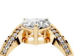Heart Cut Diamond Solitaire Engagement Ring Set in Yellow gold with Pavé Shoulders