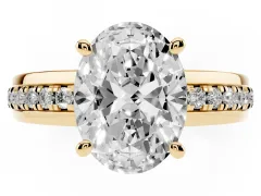 Oval Cut Diamond Solitaire Ring Set in Yellow gold with Channel Set Band and Prong Setting
