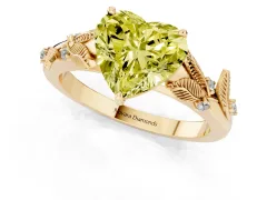 Fancy Yellow Heart Cut Diamond Solitaire Ring Set in Yellow gold with Leaf Motif Band