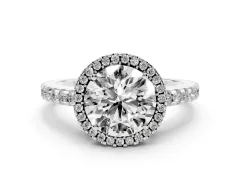 Round Cut Diamond Halo Ring Set in Platinum with Pavé Shoulders and Halo-Framed Center