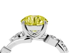 Fancy Yellow Round Cut Diamond Solitaire Ring Set in Silver with Twisted Marquise Accent Band