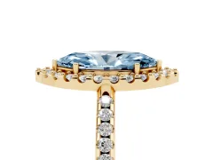Fancy Blue Marquise Cut Diamond Pavé Halo Ring Set in Yellow gold with Prong Setting
