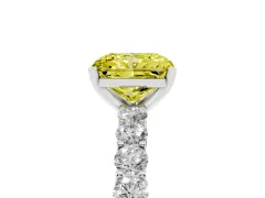 Fancy Yellow Radiant Cut Diamond Solitaire Ring Set in Platinum with Shared Prong Pavé Band