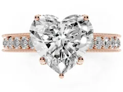 Heart Cut Diamond Solitaire Ring Set in Rose gold with Milgrain-Edged Pavé Band and Prong Setting