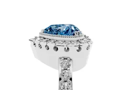 Fancy Blue Heart Cut Diamond Halo Ring Set in Platinum with Pavé Shank and Prong Setting