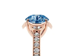Fancy Blue Round Cut Diamond Halo Ring Set in Rose gold with Channel Set Band and Prong Setting