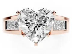 Heart Cut Diamond Solitaire Ring Set in Rose gold with Channel-Set Accent Stones and Prong Setting