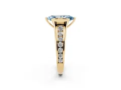 Fancy Blue Marquise Cut Diamond Bezel-Set Solitaire Ring Set in Yellow gold with Channel-Set Band