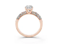 Cushion Cut Diamond Pavé Band Solitaire Ring Set in Rose gold with Close-Set Accent Stones and Prong Setting