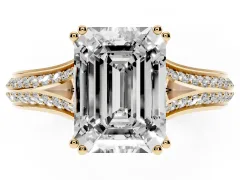 Emerald Cut Diamond Split Shank Pavé Engagement Ring Set in Yellow gold with Prong-Set Center Stone