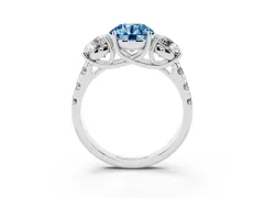 Fancy Blue Round Cut Diamond Three-Stone Ring Set in Platinum with Pavé Band