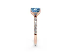 Fancy Blue Princess Cut Diamond Solitaire Engagement Ring Set in Rose gold with Round Pavé Band and Prong Setting