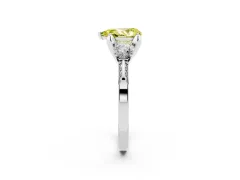 Fancy Yellow Pear Cut Diamond Three-Stone Ring Set in White gold with Pavé Band and Smaller Side Stones