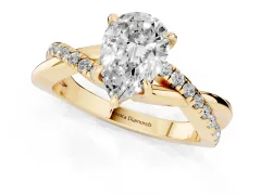Pear Cut Diamond Twisted Pavé Band Ring Set in Yellow gold with Prong Setting
