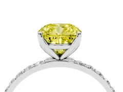 Fancy Yellow Cushion Cut Diamond Solitaire Engagement Ring Set in Platinum with Round Pavé Band and Prong Setting