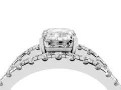 Emerald Cut Diamond Split Shank Pavé Solitaire Ring Set in Platinum with Open Shank Design