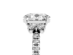 Oval Cut Diamond Three-Stone Pavé Ring Set in White gold with Prong Setting