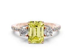 Fancy Yellow Emerald Cut Diamond Three-Stone Ring Set in Rose gold with Pavé Band and Graduated Sides