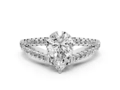 Pear Cut Diamond Split Shank Pavé Engagement Ring Set in Platinum with Prong-Held Center Stone
