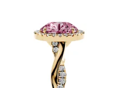 Fancy Pink Round Cut Diamond Halo Twist Band Solitaire Ring Set in Yellow gold with Prong Setting