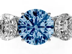 Fancy Blue Round Cut Diamond Three-Stone Ring Set in Silver with Textured Band