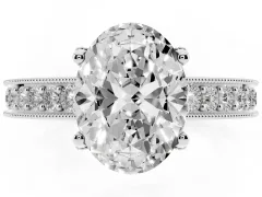 Oval Cut Diamond Solitaire Ring Set in White gold with Milgrain-Edged Pavé Band and Prong Setting