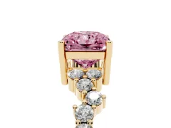Fancy Pink Radiant Cut Diamond Ring Set in Yellow gold with Scattered Round Accents