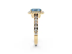 Fancy Blue Emerald Cut Diamond Halo Engagement Ring Set in Yellow gold with Pavé Band and Prong-Set Center