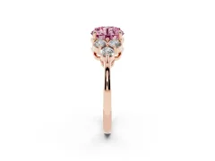 Fancy Pink Round Cut Diamond Solitaire Ring Set in Rose gold with Cluster Accents on Each Side