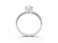Pear Cut Diamond Solitaire Ring Set in Platinum with Multi-Row Round Pavé Band and Prong Setting