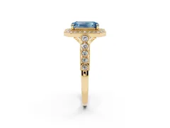 Fancy Blue Emerald Cut Diamond Milgrain Halo Solitaire Ring Set in Yellow gold with Bezel Set Side Stones and Pavé Band