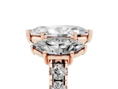 Marquise Cut Diamond Three-Stone Ring Set in Rose gold with Pavé Band