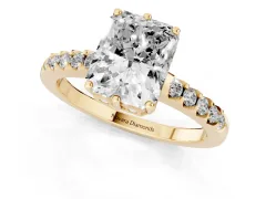 Radiant Cut Diamond Solitaire Engagement Ring Set in Yellow gold with Pavé Band and Prong Setting