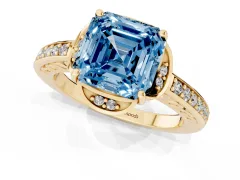 Fancy Blue Asscher Cut Diamond Halo Ring Set in Yellow gold with Channel Set Band and Prong Setting