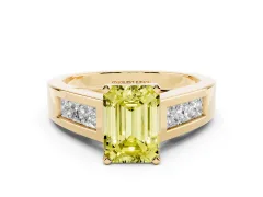 Fancy Yellow Emerald Cut Diamond Solitaire Ring Set in Yellow gold with Channel-Set Accent Stones and Prong Setting