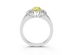 Fancy Yellow Pear Cut Diamond Three-Stone Ring Set in Platinum with Bold Center and Classic Band