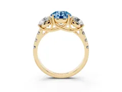 Fancy Blue Round Cut Diamond Three-Stone Ring Set in Yellow gold with Pavé Band