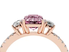 Fancy Pink Emerald Cut Diamond Three-Stone Ring Set in Rose gold with Pavé Band and Graduated Sides