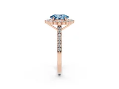 Fancy Blue Oval Cut Diamond Halo Ring Set in Rose gold with Pavé Band and Prong Setting