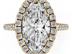 Marquise Cut Diamond Pavé Halo Engagement Ring Set in Yellow gold with Pavé Band and Prong Setting