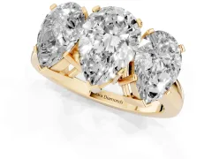 Pear Cut Diamond Three-Stone Ring Set in Yellow gold with Channel-Set Band and Prong Settings