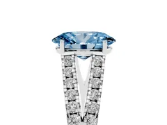 Fancy Blue Oval Cut Diamond Split Shank Pavé Engagement Ring Set in White gold with Prong-Held Center Stone