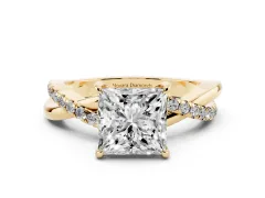 Princess Cut Diamond Twisted Pavé Band Ring Set in Yellow gold with Prong Setting