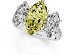 Fancy Yellow Marquise Cut Diamond Three-Stone Ring Set in Platinum with Pavé Band