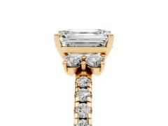 Emerald Cut Diamond Three-Stone Pavé Ring Set in Yellow gold with Prong Setting