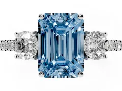 Fancy Blue Emerald Cut Diamond Three-Stone Ring Set in White gold with Pavé Band and Graduated Sides